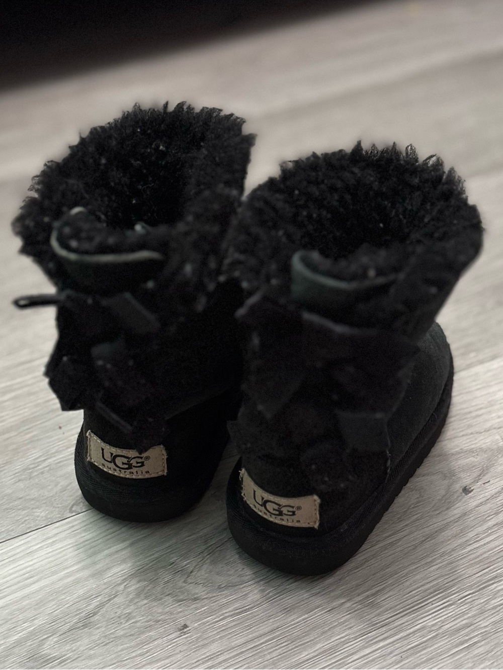 UGG Kids Black Suede Shearling Bow Boots Size 7